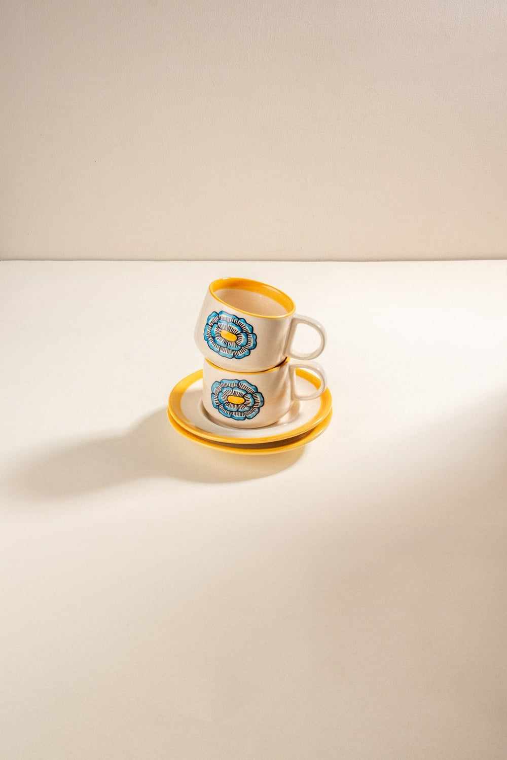 10000017412 TULUKKA CUP & SAUCER (SET OF 2) MUSTARD YELL