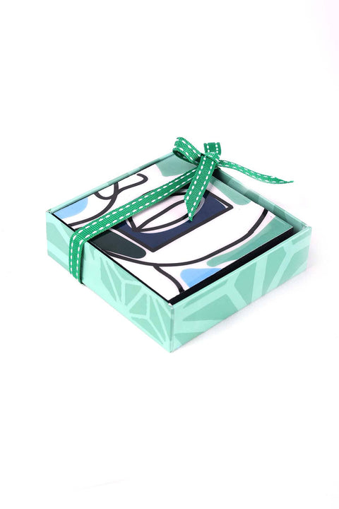 TRIVETS & COASTERS Faces Aqua Blue Coaster (Set Of 4)