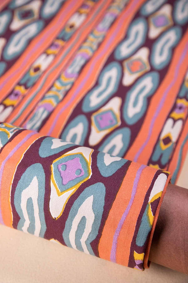 PRINT & PATTERN UPHOLSTERY FABRICS Mire Ikkat Printed Upholstery Fabric (Madder Multi)