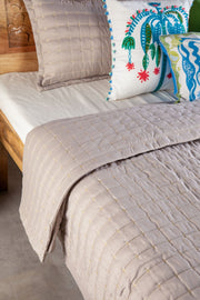 SOLID & TEXTURED BEDCOVERS Moira Sliver Sand Quilted Bedcover