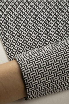 SOLID & TEXTURED UPHOLSTERY FABRICS Nilgiri Solid Upholstery Fabric (Black/White)