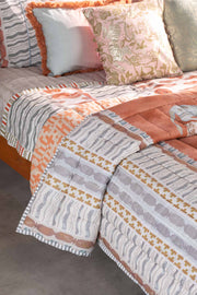 DANCE OF THE YALIS PRINT & PATTERN QUILT RUST