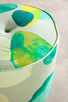 Upholstered Bundle Flower Pouffe in Chasing Monsoon Fabric