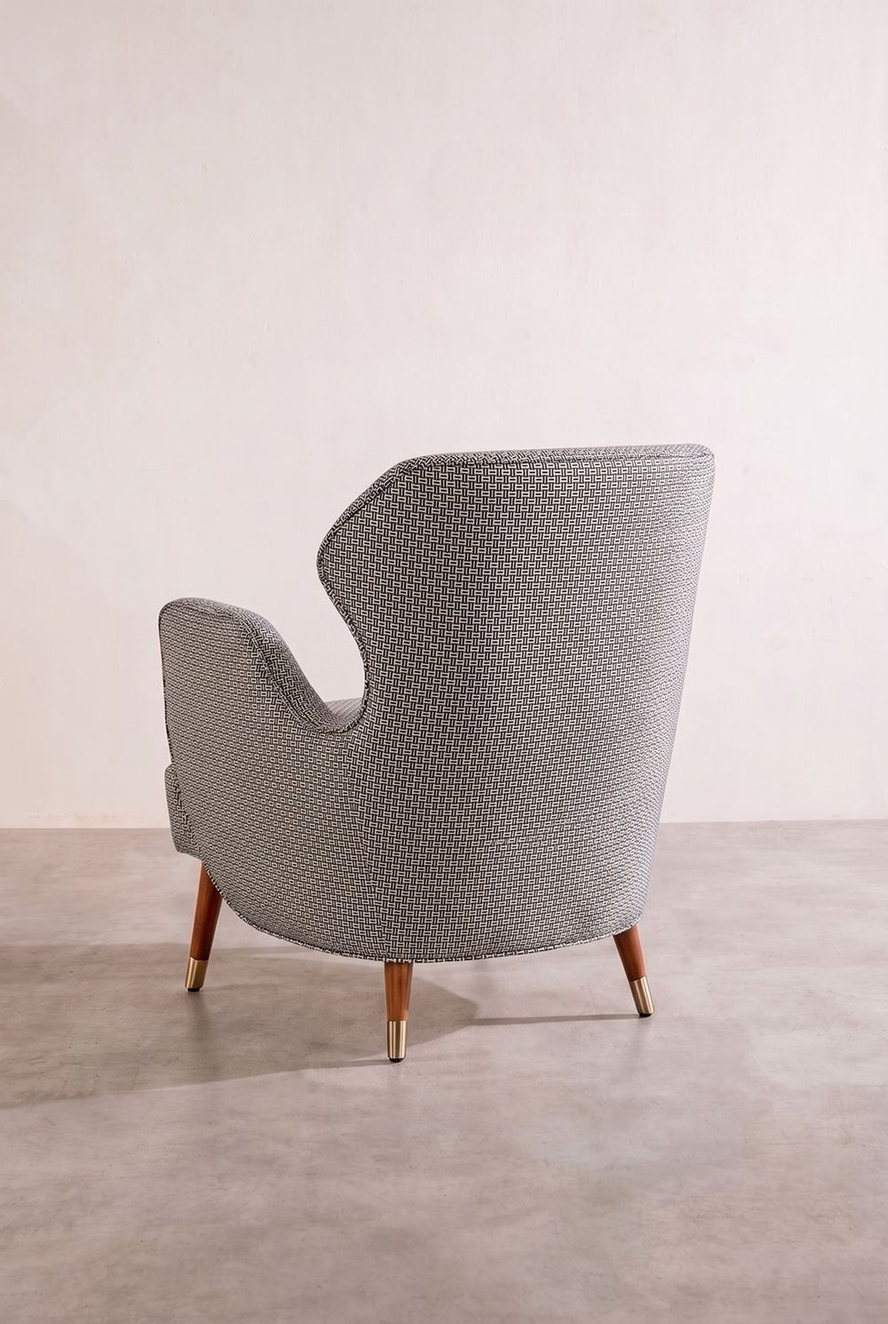 Upholstered Bundle Winged Accent Chair in Nilgiri Black and White Fabric