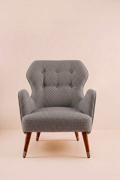 Upholstered Bundle Winged Accent Chair in Nilgiri Black and White Fabric